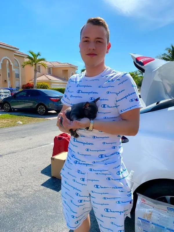 Happy family with their bulldog from Master Bulldogs Miami - Family 12