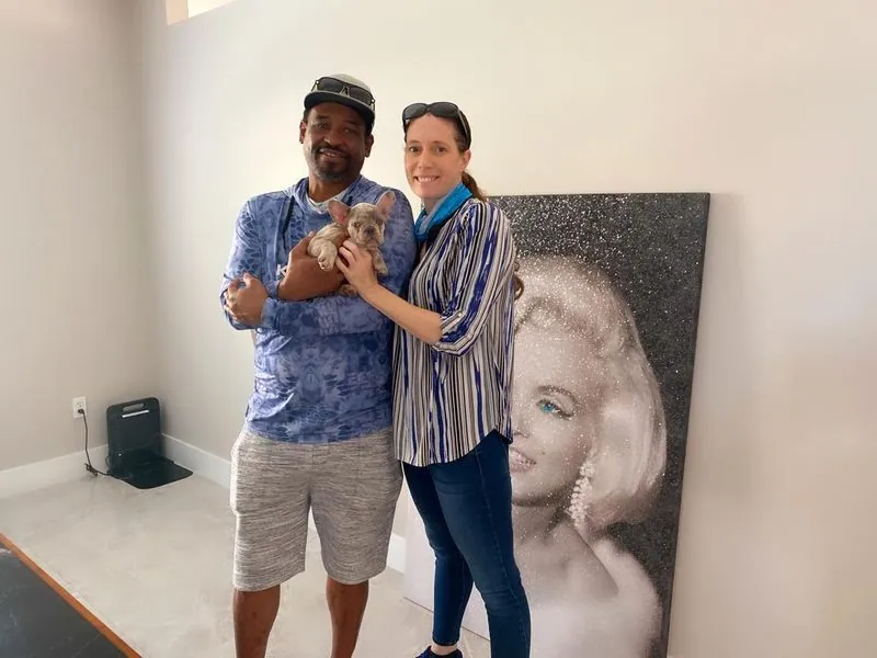 Happy family with their bulldog from Master Bulldogs Miami - Family 16