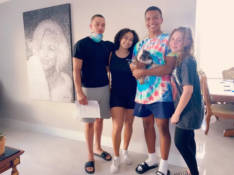 Happy family with their bulldog from Master Bulldogs Miami - Family 21