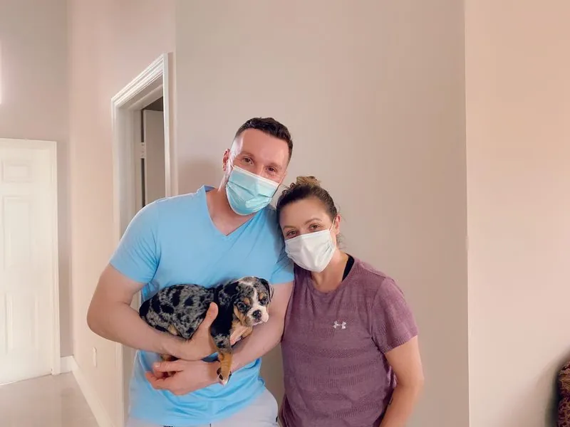 Happy family with their bulldog from Master Bulldogs Miami - Family 22